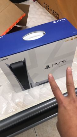 PS5 in hand