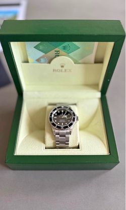 Rolex submariner Date Black dial 40mm