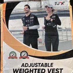 New 15 lb weighted vest by FUFF . good for running, walking, weight lifting, exercise etc . has reflective stripes