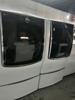 LG 5.2 cu. ft. Large Smart wi-fi Enabled Front Load Washer TurboWash And 9.0 cu. ft. Large Smart wi-fi Enabled Electric Dryer w/ TurboSteam