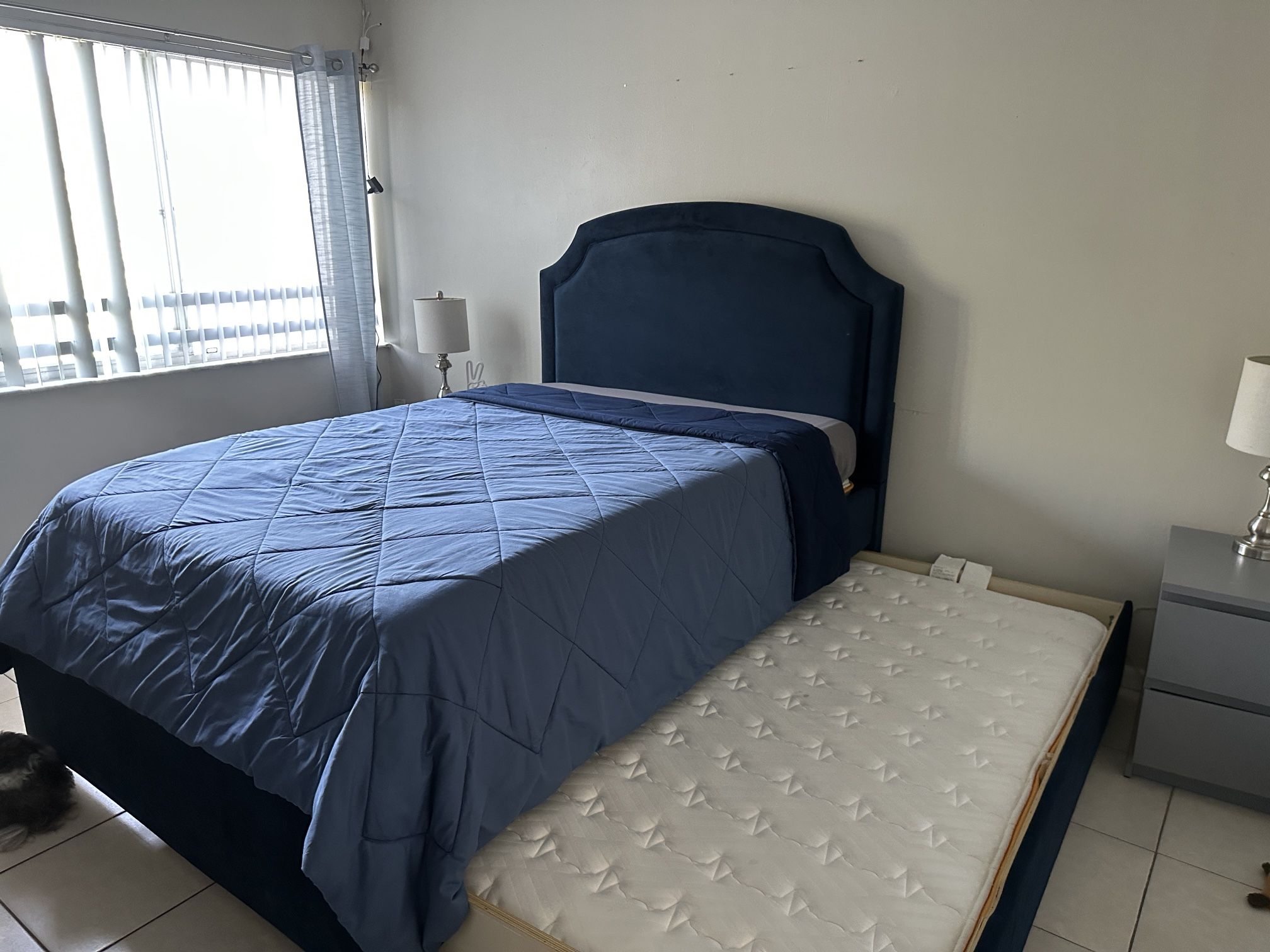 Full bed with a pull-out twin trundle bed.