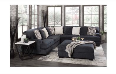 Rawcliff sectional and ottoman  from Ashley