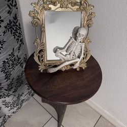 Hallowing Decorative Mirror With Skeleton And A Wooden Coffee Table 