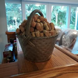 Solid  Aluminum Ice bucket Loaded With Corks Located In  Palm Beach Gardens