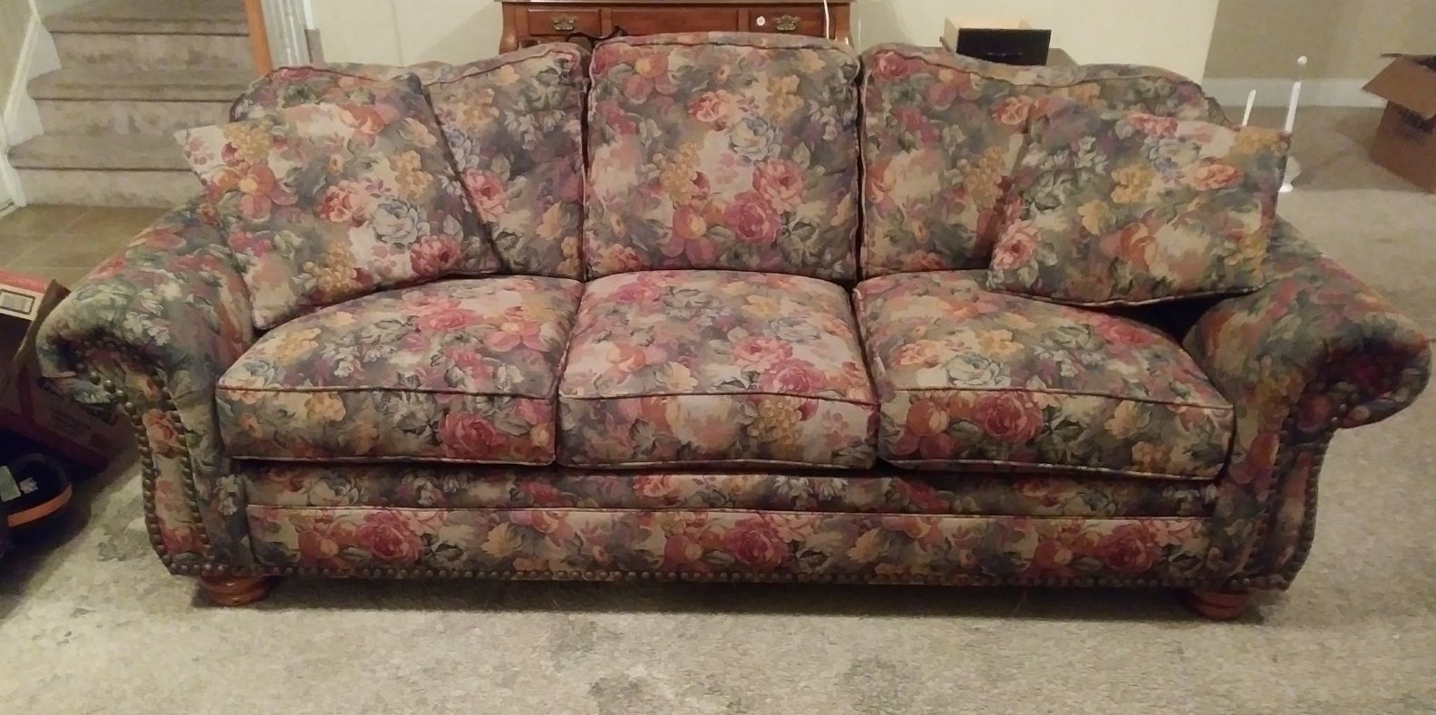 Floral couch with matching pillows