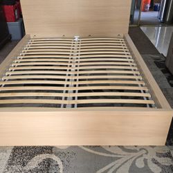 Queen-size bed frame from IKEA