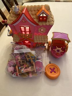 Lalaloopsy house with dolls and furniture, and remote control boat