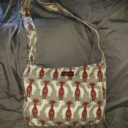 Bungalow 360 Small Messenger Bag with an alpaca pattern. 