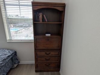 Standing book case/clothes draws