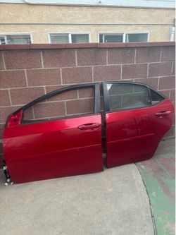 LEFT DRIVER SIDE DOORS 2014-2019 TOYOTA COROLLA (RED COLOR).
