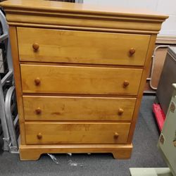 Tall solid wood dresser in great condition