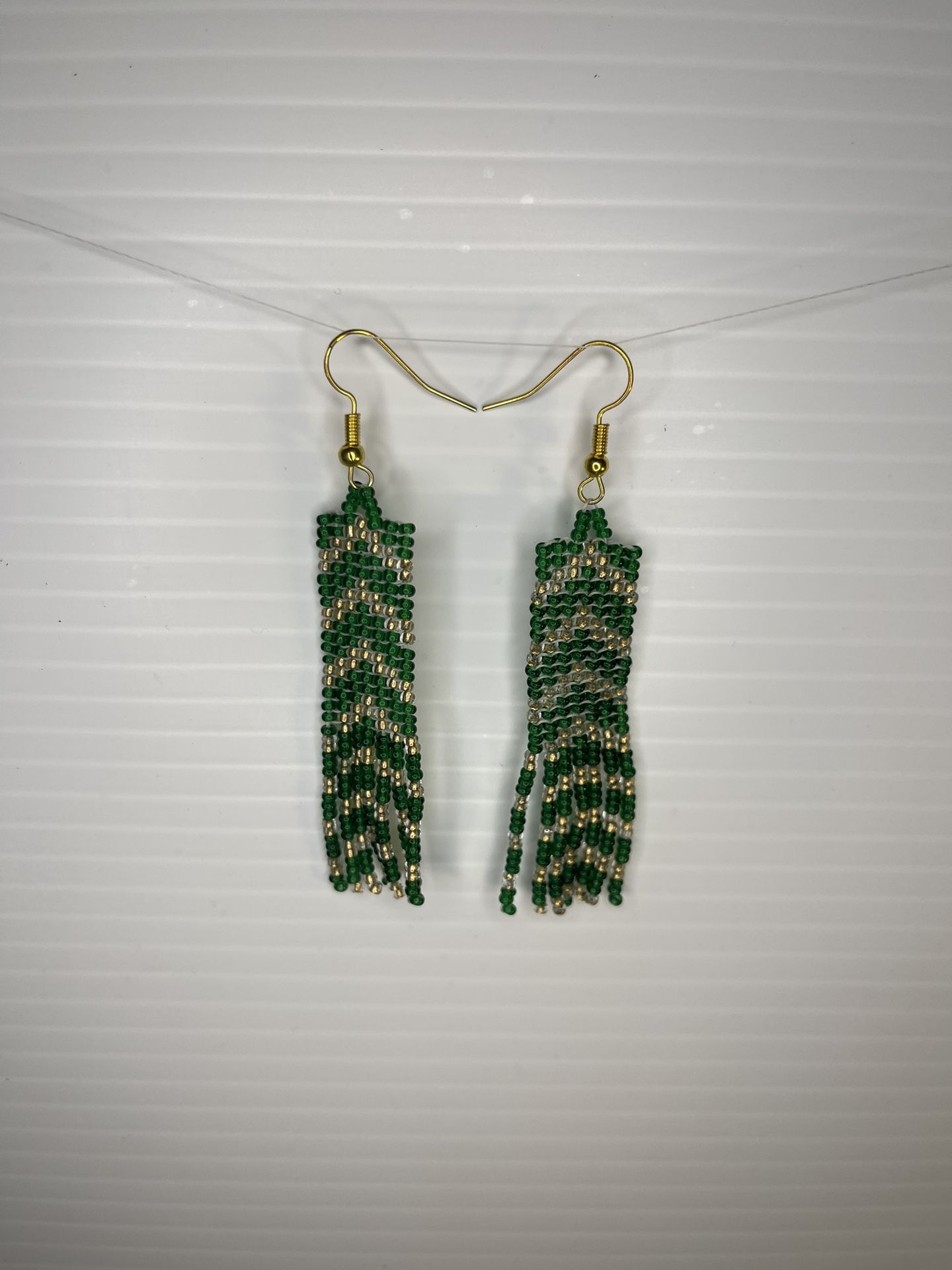 Gold and emerald green chevron fringe dangle earrings