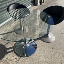 mid-century modern glass and chrome pedestal table