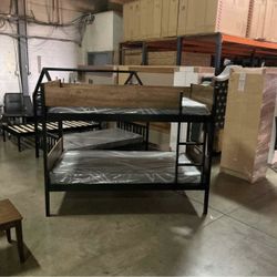 Twin bunk bed. Comes in espresso. Assembly required. Assembly not included. Taxes included. Free delivery.  Bunk bed only-$220 Bunk bed with mattresse