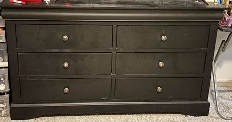 Black dresser with nightstand
