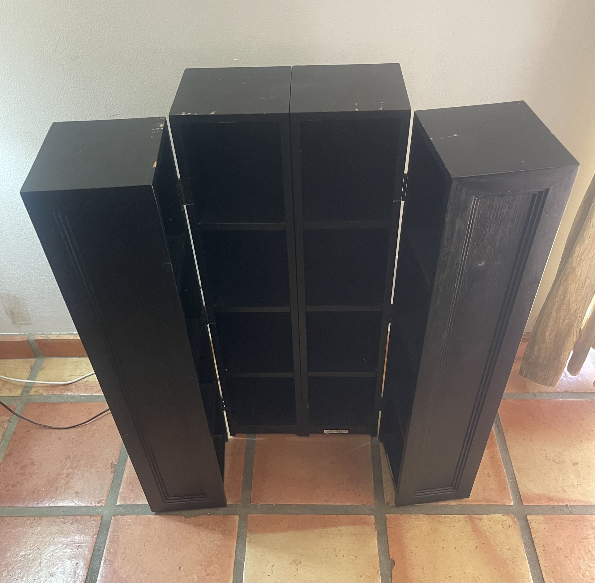 Black DVD cabinet holds over 150 DVDs