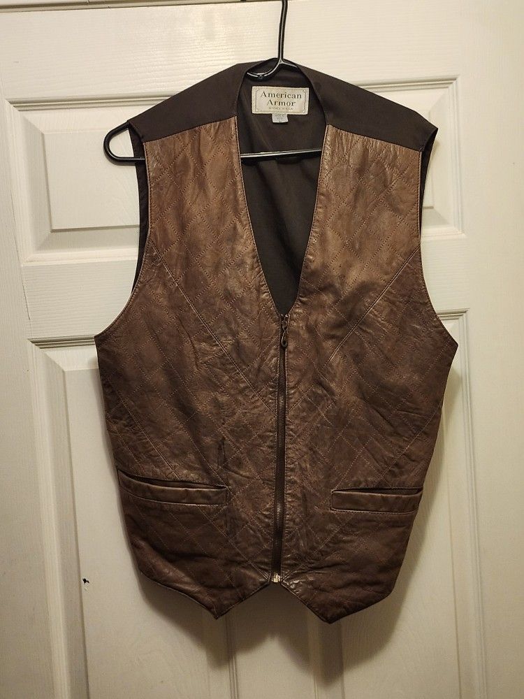 American Armor brown quilted leather vest with a zipper closure