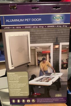 Brand new Aluminum Pet door Large up to 100lbs dog