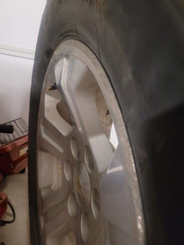 Full Set Of Chevy 18s And Two Extra Tires