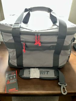 Soft-sided insulated cooler bag