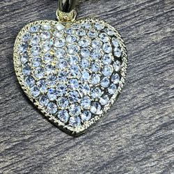 new necklace with heart shapped pendant with faux diamonds