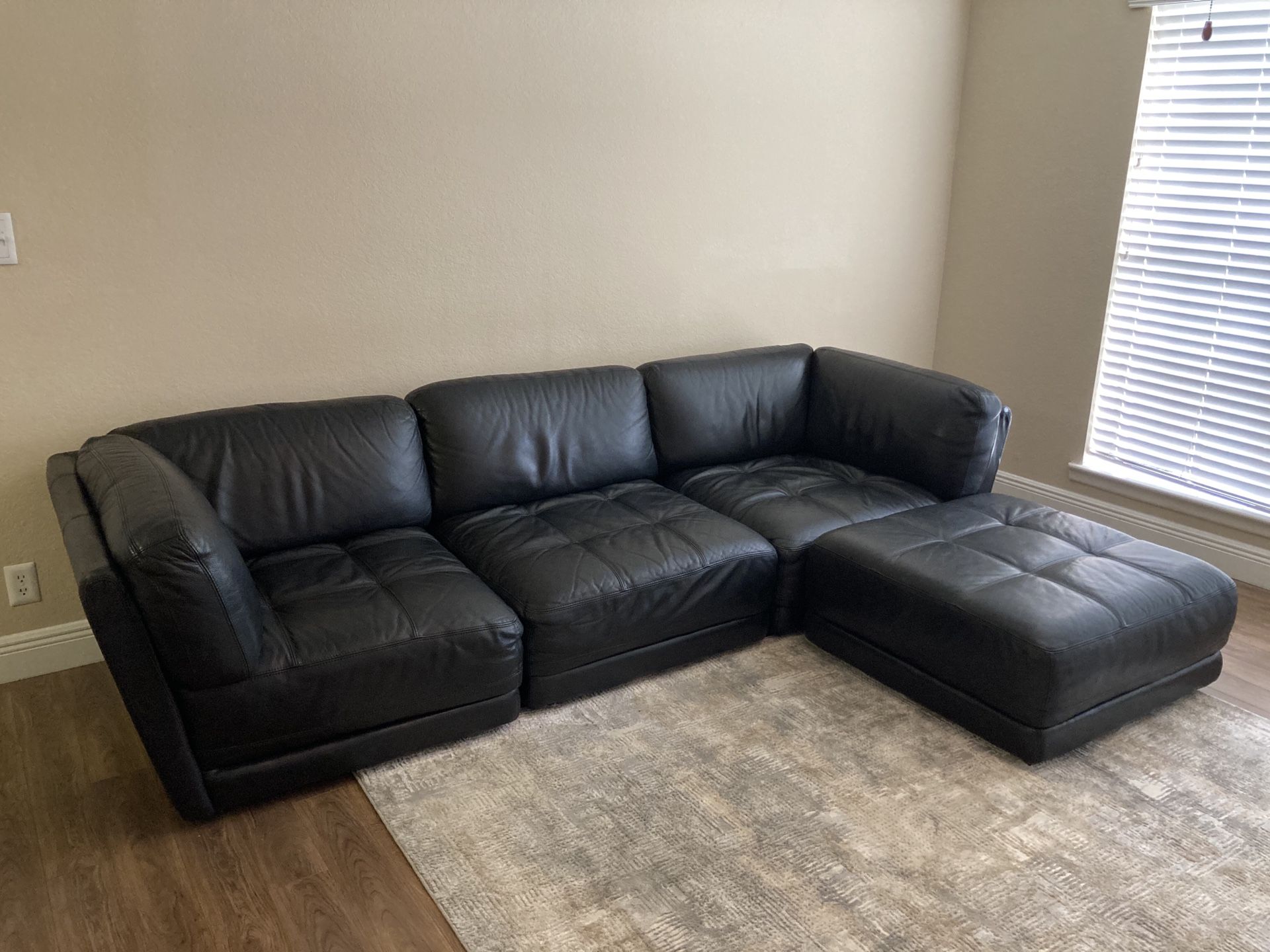 Chateau D’ax Black Leather Sectional
