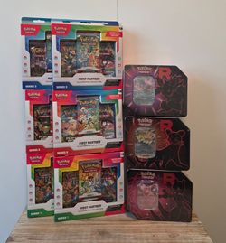 Pokémon First Partner Sets and Team Rocket Tins Destined Rivals