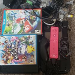 Wii U with 2games, Extra Controller And Wii Controller 