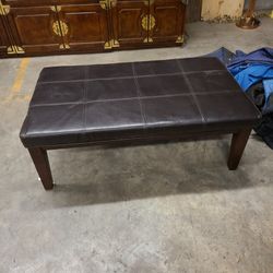 Leather top large ottoman with pull out trays