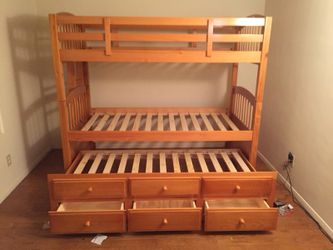 Triple bunkbed with storage drawers