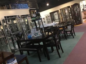 Mollai dining room table and chairs