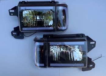 87-91 Ford F-150, F-250, F-350 & Bronco LED Headlights; Black Housing With Amber Corners