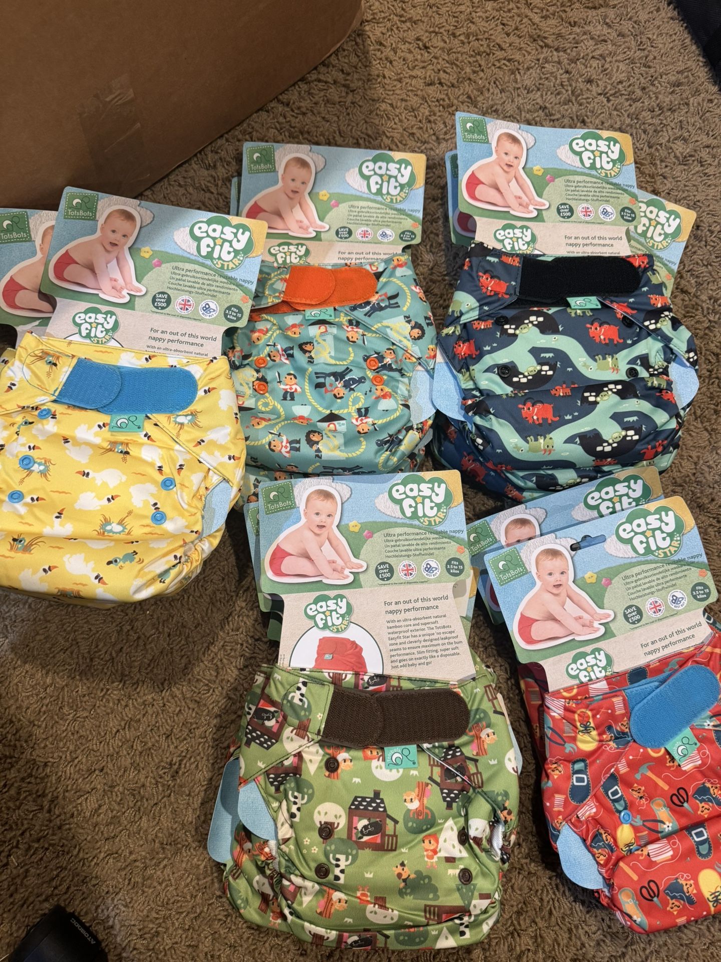 Numerous new Cloth Diapers, covers, and inserts.