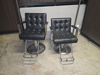 Pair of Black Hydraulic Barber Chairs