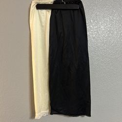 2 black white half slip skirt size medium