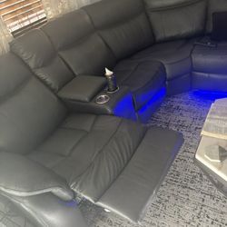 Black Sectional Coach Chargers Phone With Lights