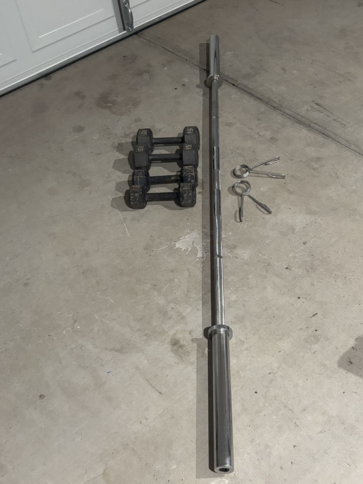 Olympic Bar With Sets Of 10/15 lb Dumbbells 