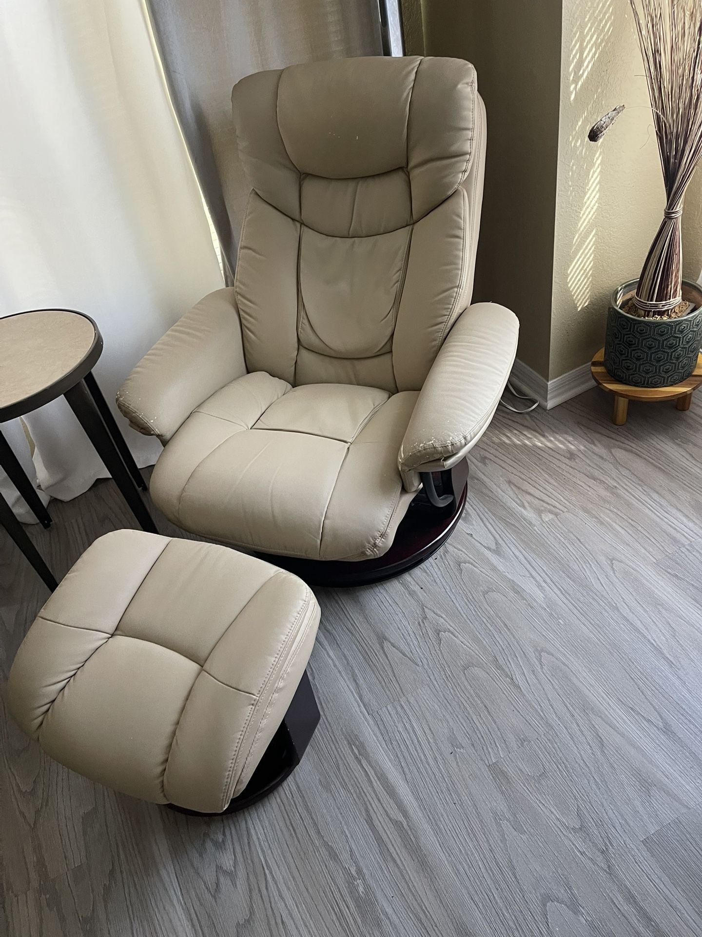 Armchair with ottoman