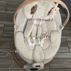 Electric swing, a bouncer, and bassinet