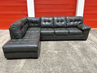 Gray leather Sectional couch (Delivery Available)