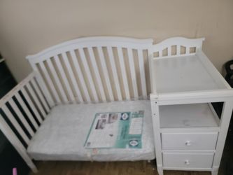Toddler bed with changer