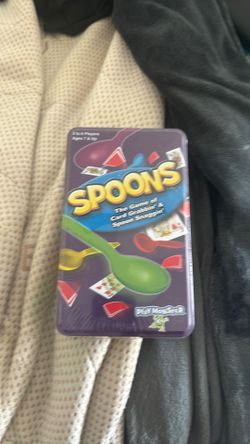 Spoons the game of card grabbing and spoon snagging
