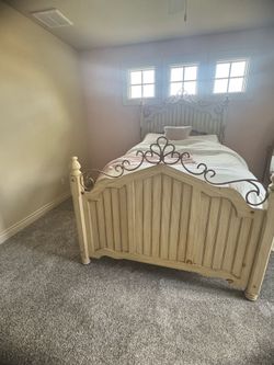 Bed frame, mattress, and spring box.