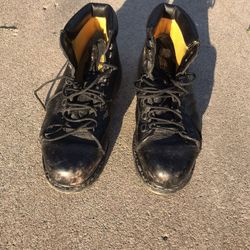 Black pair of Caterpillar steel toe wide width work boots