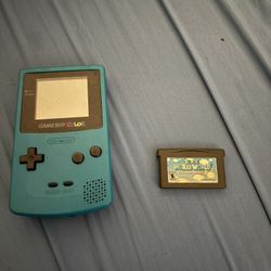 Blue/Cyan Gameboy Color And Super Mario World Advance 2