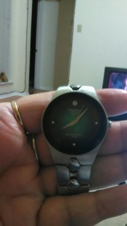 Like new, Men's Armitron Diamond WATCH Stainless Steel Water Resistant Silver/ Teal