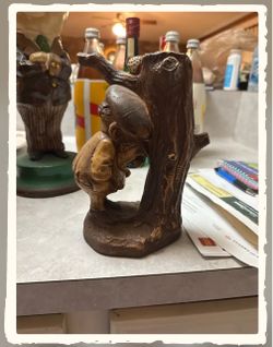 Vintage Gnome Figurine with Tree Trunk