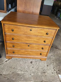 Chest of Drawers approx 23x32x30""tall has 2 drawers (althougth it looks like 4) oak?