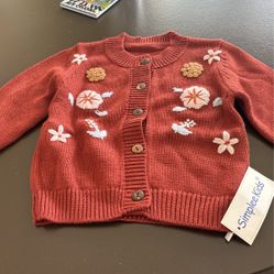 Baby cardigan. Sweaters