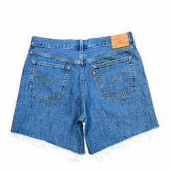 Levi's 501 blue raw hem mid thigh denim shorts